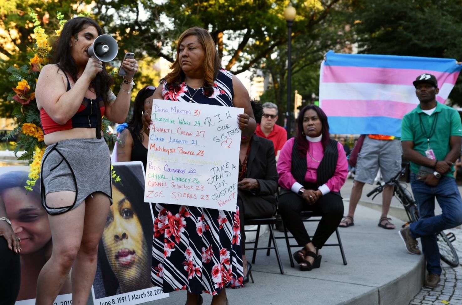 On Friday, June 21, 2019, a speaker recounts her experience with violence as a member of the LGBTQ community. (WTOP/Alejandro Alvarez)