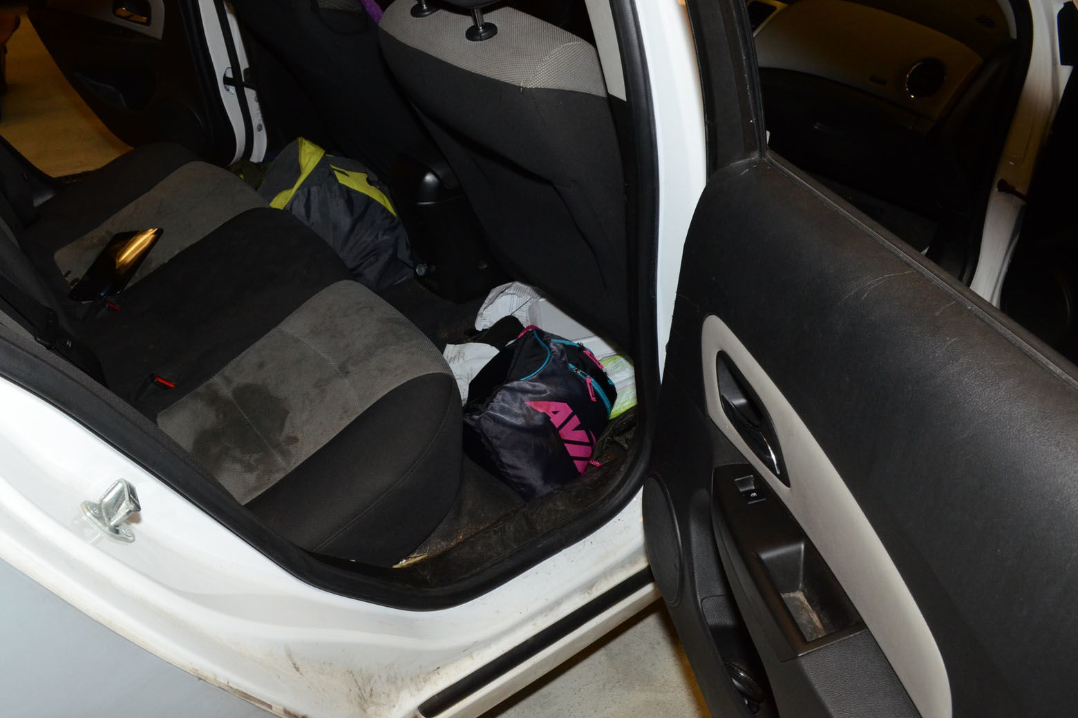 A look inside the Chevy Cruze where Daron Wint was riding when he was arrested. The black and pink drawstring backpack was Daron's.