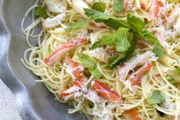 This May 2, 2011 photo shows angel hair pasta with crabmeat, jalapeno and mint in Concord, N.H. Chef Jonathan Waxman, of the New York restaurant Barbuto, says freshly cooked crab is essential for this recipe.   (AP Photo/Matthew Mead)