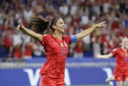United States' Alex Morgan celebrates after scoring her side's second goal during the Women's World Cup semifinal soccer match between England and the United States, at the Stade de Lyon, outside Lyon, France, Tuesday, July 2, 2019. (AP Photo/Alessandra Tarantino)