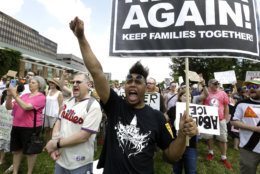 Protestors assembled by a majority Jewish group called "Never Again Is Now" demonstrate near Independence Hall Thursday, July 4, 2019, in Philadelphia. Hundreds gathered during the city's traditional Fourth of July parade to protest the treatment of immigrants and asylum seekers. (AP Photo/Jacqueline Larma)