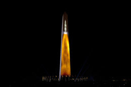 An image of a 363-foot Saturn V rocket used in the Apollo 11 mission, blasting off, is projected on the Washington Monument, during the 50th anniversary of the Apollo moon landing festivities at the National Mall in Washington, Friday, July 19, 2019. (AP Photo/Jose Luis Magana)
