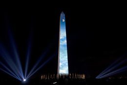 The Moon is projected on the Washington Monument, during the 50th anniversary of the Apollo moon landing festivities at the National Mall in Washington, Friday, July 19, 2019. (AP Photo/Jose Luis Magana)