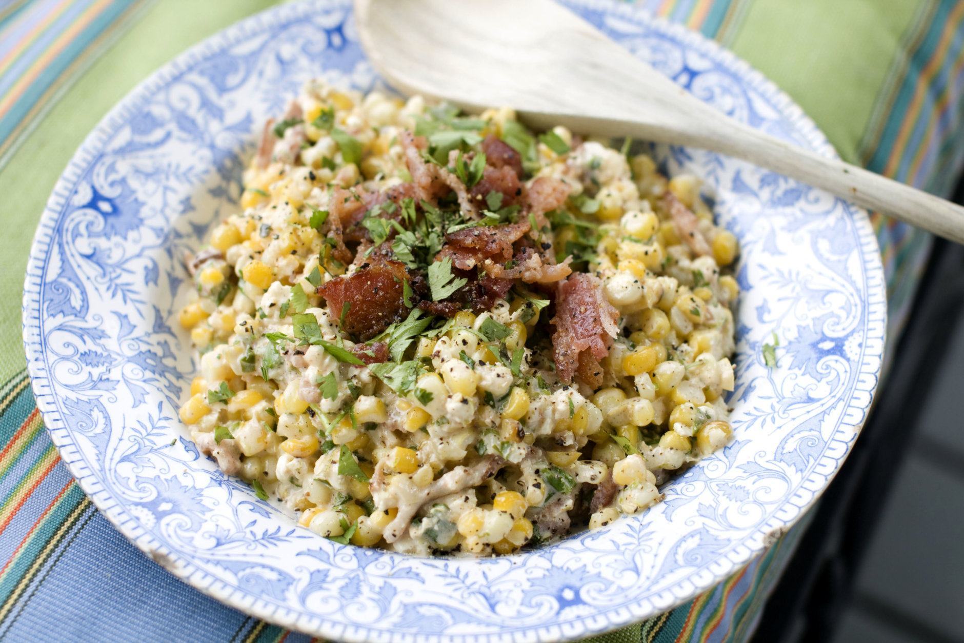 This July 29, 2013 photo shows grilled Mexican street corn salad in Concord, N.H. (AP Photo/Matthew Mead)