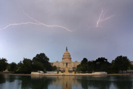Lightning is seen over the Capitol during a storm on July 6, 2019, in D.C. (WTOP/Dave Dildine)