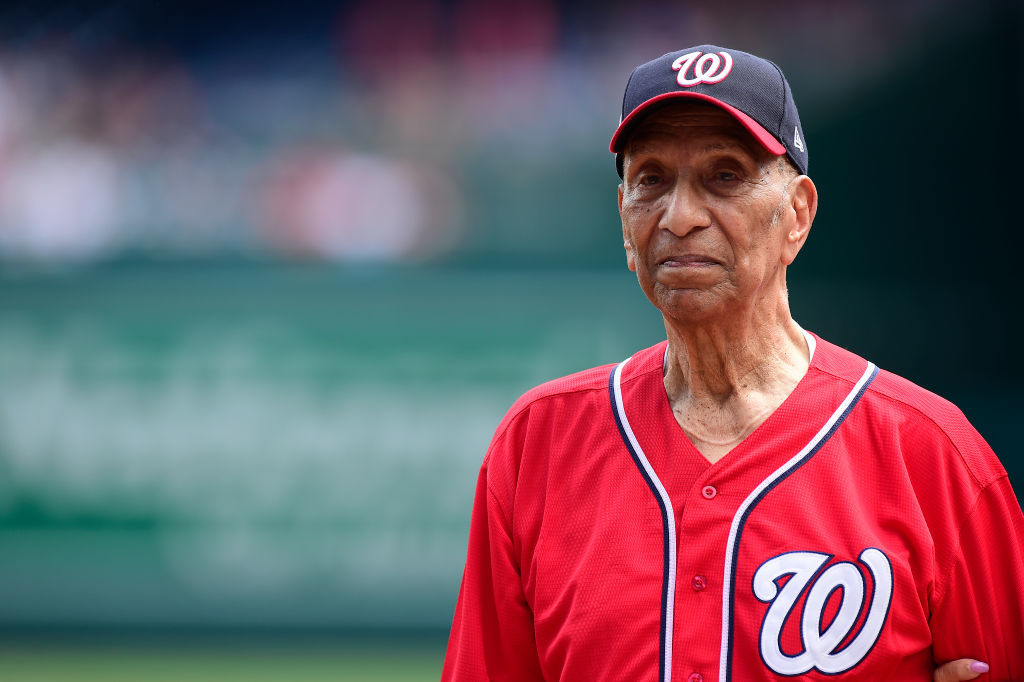 WASHINGTON, DC - JULY 04: World War II veteran Ellsworth Hutchinson, Jr. stands at home plate before a game between the Miami Marlins and Nationals at Nationals Park on July 4, 2019 in Washington, DC. (Photo by Patrick McDermott/Getty Images)