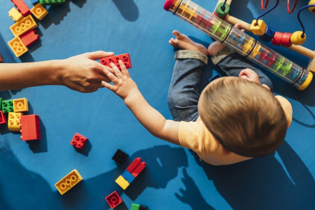 Baby playing with toys