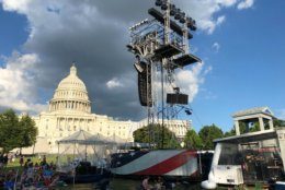 Music wafted through the steamy air near the U.S. Capitol Wednesday as rehearsals were held for Independence Day's "A Capitol Fourth" concert on the West Lawn. (WTOP/Michelle Basch)