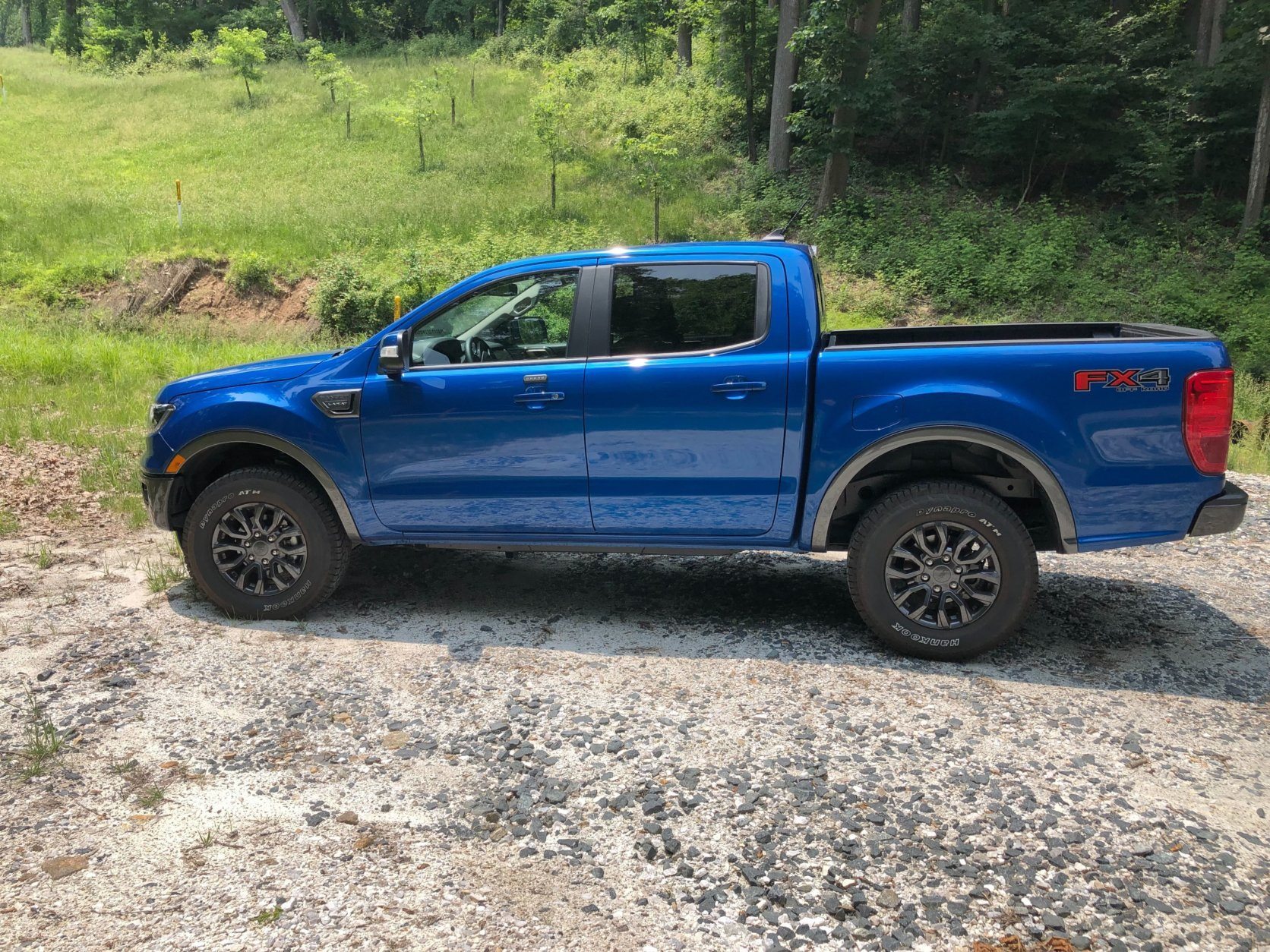 <p>Most will come with a four-door Super Crew cab and a five-foot bed. My test ride was the loaded $38,385 Lariat trim level with another $1,295 FX4 off road package added. It sports beefy wheels and tires with pretty aggressive tread for a street tire.</p>
<p>The Ford Ranger comes with just one engine and transmission, a 2.3L EcoBoost four banger and a 10-speed automatic. They work well together and provide good performance, but turbo four isn’t as smooth as V6 engines in some of the other small trucks we’ll be looking at soon. I noticed a bit of turbo lag as well, but once you get going the power is snappy and the truck keeps up with traffic easily.</p>
<p>&nbsp;</p>
