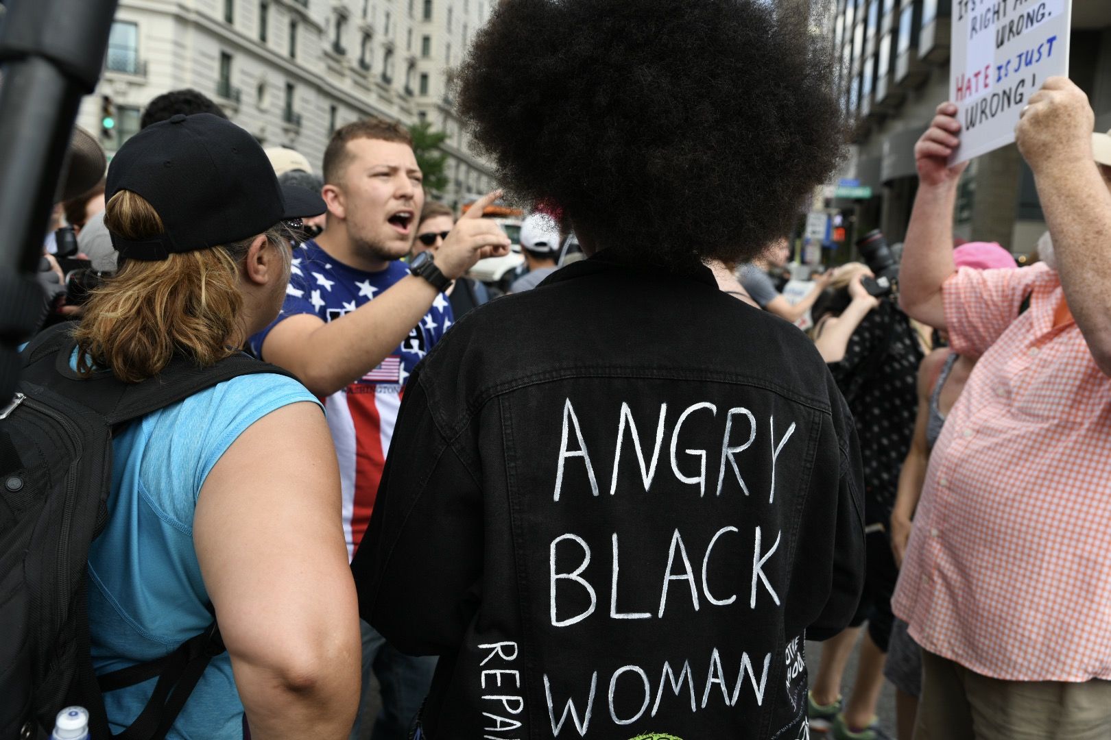 A supporter of President Donald Trump is surrounded by counter-protesters to a far-right event in Washington, D.C.’s Freedom Plaza on July 6, 2019. Trump supporters and anti-fascist organizers held dueling rallies across the street from each other, leading to high tensions as D.C. and U.S. Park Police largely held the peace. (WTOP/Alejandro Alvarez)