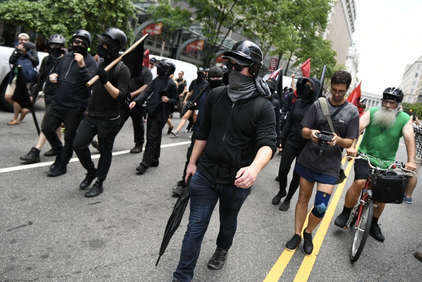 Far-left antifa protesters march down Washington, D.C.’s F Street on July 6, 2019, in an attempt to disrupt a far-right rally in Freedom Plaza. Trump supporters and anti-fascist organizers held dueling rallies across the street from each other, leading to high tensions as D.C. and U.S. Park Police largely held the peace. (WTOP/Alejandro Alvarez)