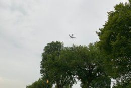 Air Force One flies over the National Mall. (WTOP/Mike Murillo)