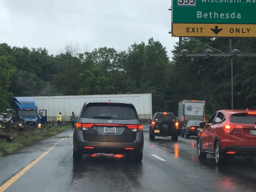 A tractor-trailer clogs the Capital Beltway