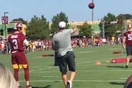 Jay Gruden throws football