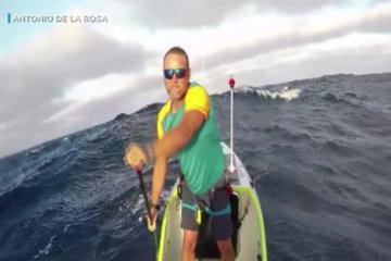 Man’s paddleboard trip across Pacific breaks record