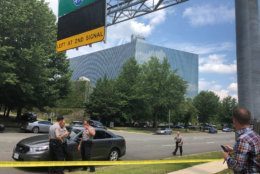 Police investigating reports of an armed man near the Gannett building in McLean, Virginia. (WTOP/Max Smith)
