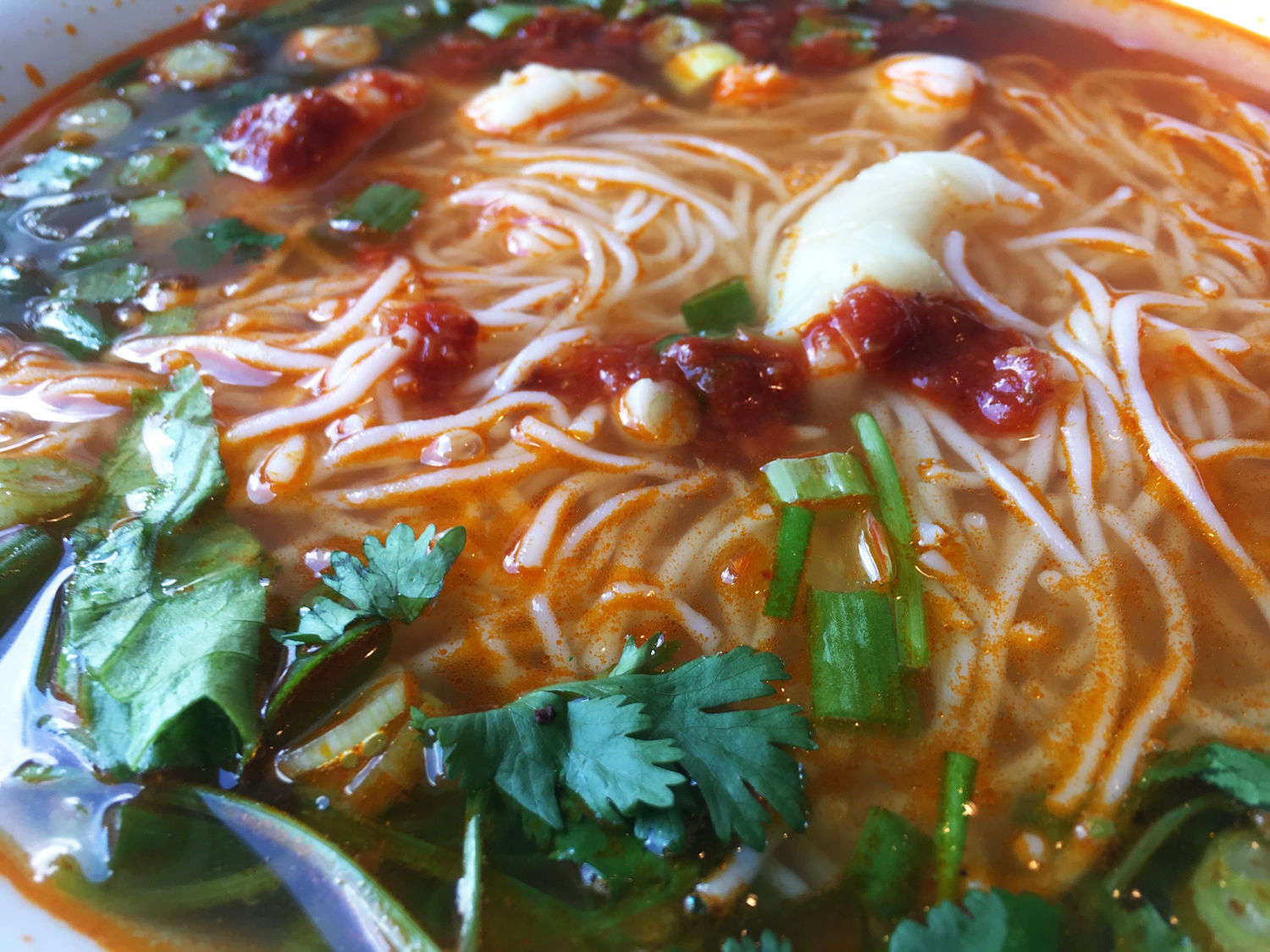 <p><span style="font-weight: 400;"><strong>$12.95:</strong> If you’re a fan of pho, but haven’t branched out to southern Vietnamese cooking, let the menu at </span><span style="font-weight: 400;"><a href="https://www.bunwdc.com/" target="_blank" rel="noopener">Bún DC</a> (pronounced &#8220;boon&#8221; — 2905 Sherman Ave. NW) be your guide. The next bad dish I have will be my first, but the one I always go back to is the </span><span style="font-weight: 400;">#31. </span><span style="font-weight: 400;">Tôm &amp; Mực, an enormous bowl of vermicelli noodle soup with a rich, tomato crab broth unlike anything else I’ve ever had. — Noah Frank</span></p>
<p><span style="font-weight: 400;"><strong>$14.50:</strong> Sushi is expensive. But if you’ve got a hankering for some fresh fish and can’t afford to break the bank, the sakedon at <a href="http://www.donburidc.com/" target="_blank" rel="noopener">Donburi</a> (2438 18th St. NW and 114 19th St. NW) is a pile of thick-cut salmon on top of a bowl of rice along with pickled cucumbers, radish, and ginger. It’s a full meal, all for a reasonable price. — Noah Frank</span></p>
