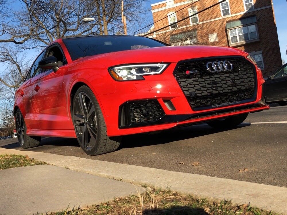 <p><strong>2018 Audi RS3 Sedan 2.5T Quattro S tronic</strong></p>
<p><strong>Price</strong>: $68,800 as driven</p>
<p>An insane combination of a powerful engine in a small car, in a &#8220;dear God, look at me&#8221; orange-red — technically speaking, Catalunya Red metallic.</p>
