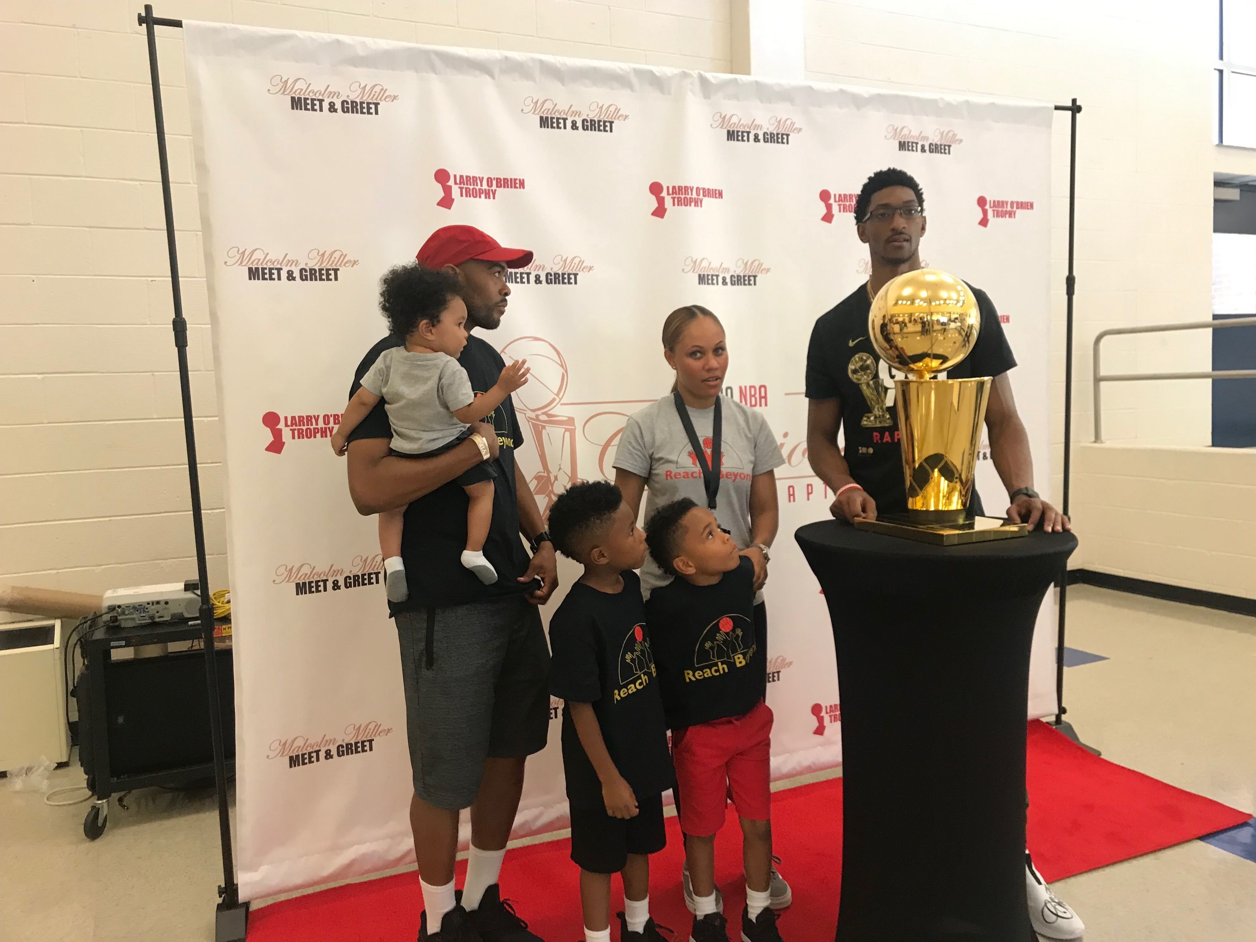 NBA champ Malcolm Miller brings Larry O'Brien trophy to