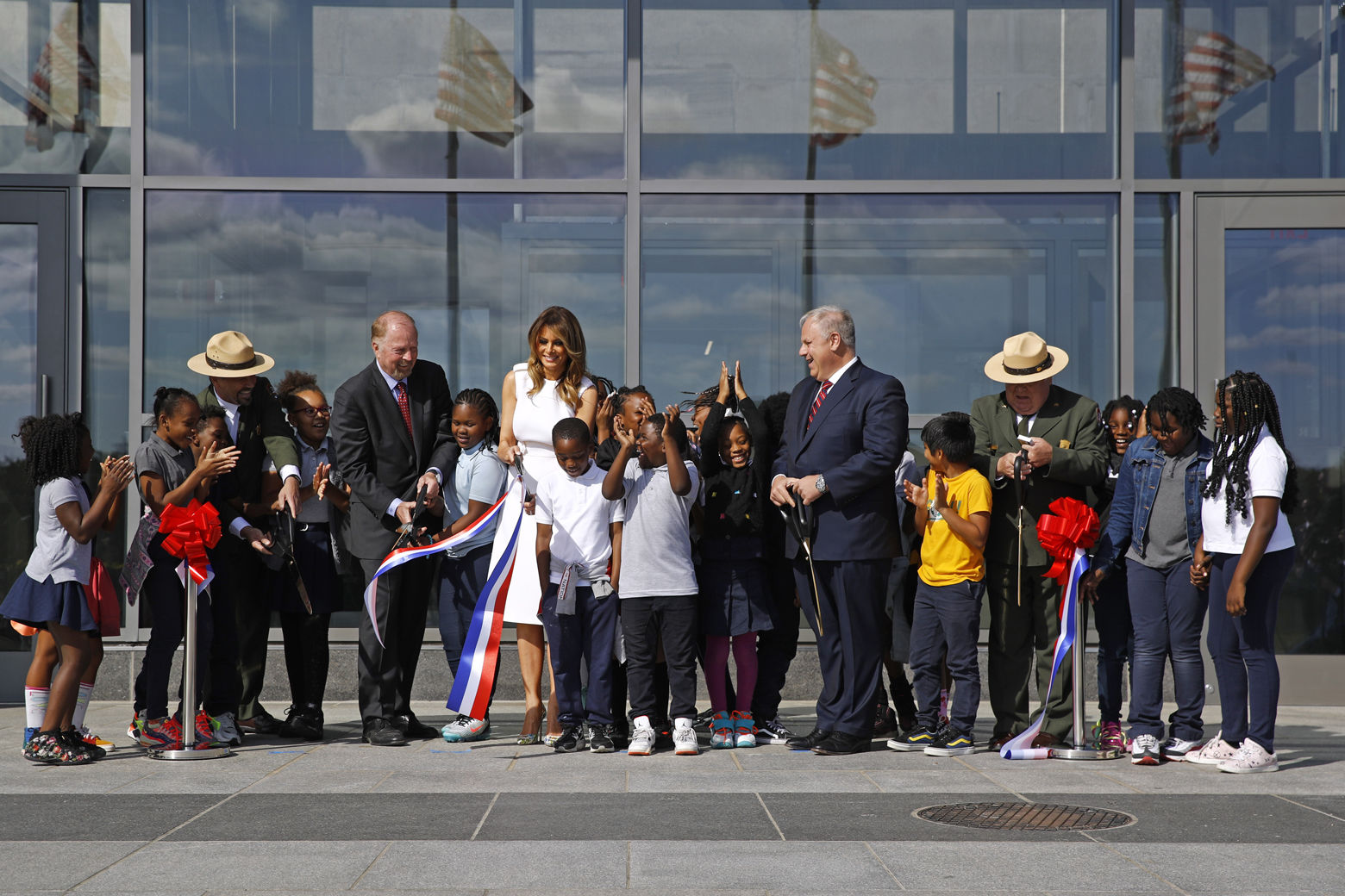 First lady Melania Trump participates in a ribbon-cutting ceremony to re-open the Washington Monument, Thursday, Sept. 19, 2019, in Washington. The monument has been closed to the public for renovations since August 2016. Trump was joined by students from Amidon-Bowen Elementary School in Washington. (AP Photo/Patrick Semansky)