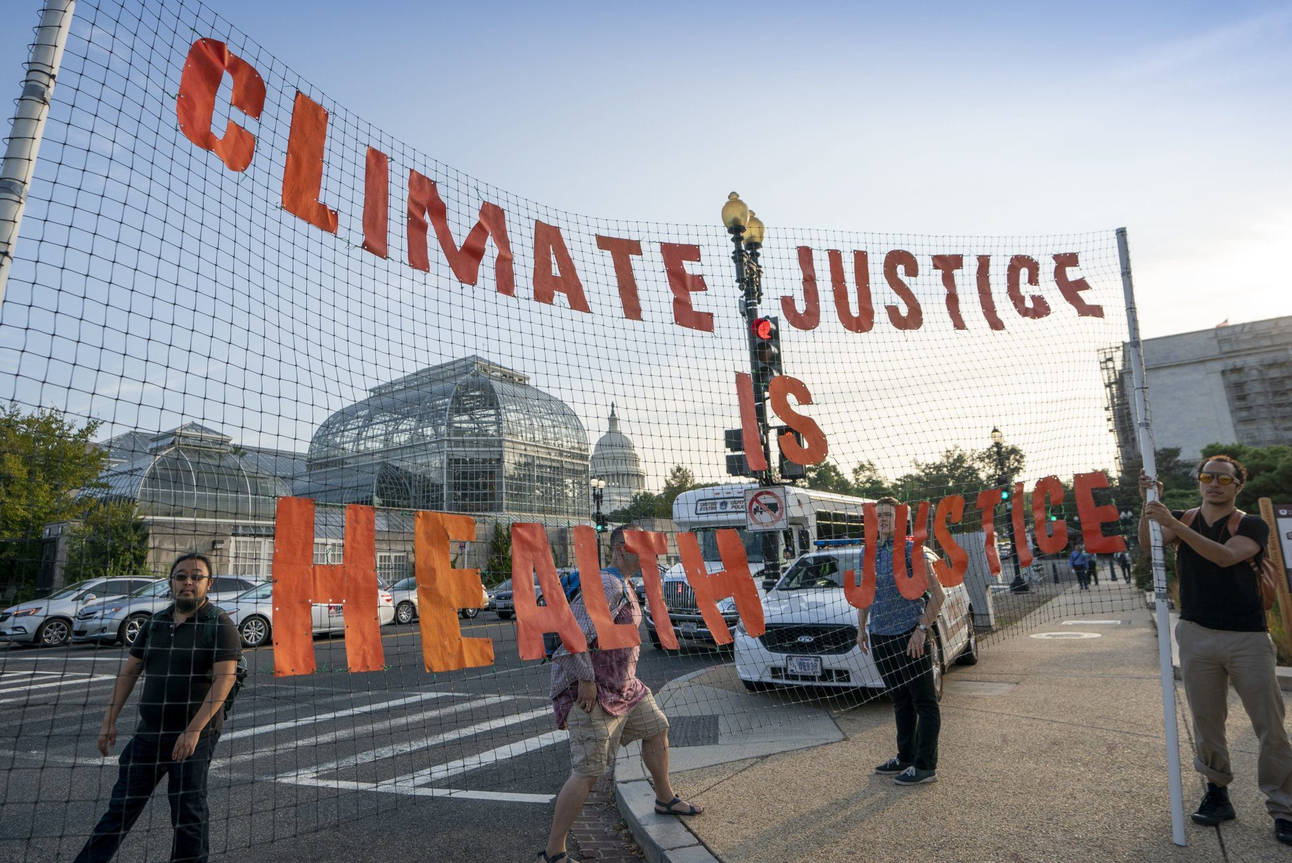 Climate activists participate in a 'Shut Down DC' protest to urge action on the climate crisis, on Independence Avenue near Capitol Hill in Washington, Monday, Sept. 23, 2019. (AP Photo/J. Scott Applewhite)