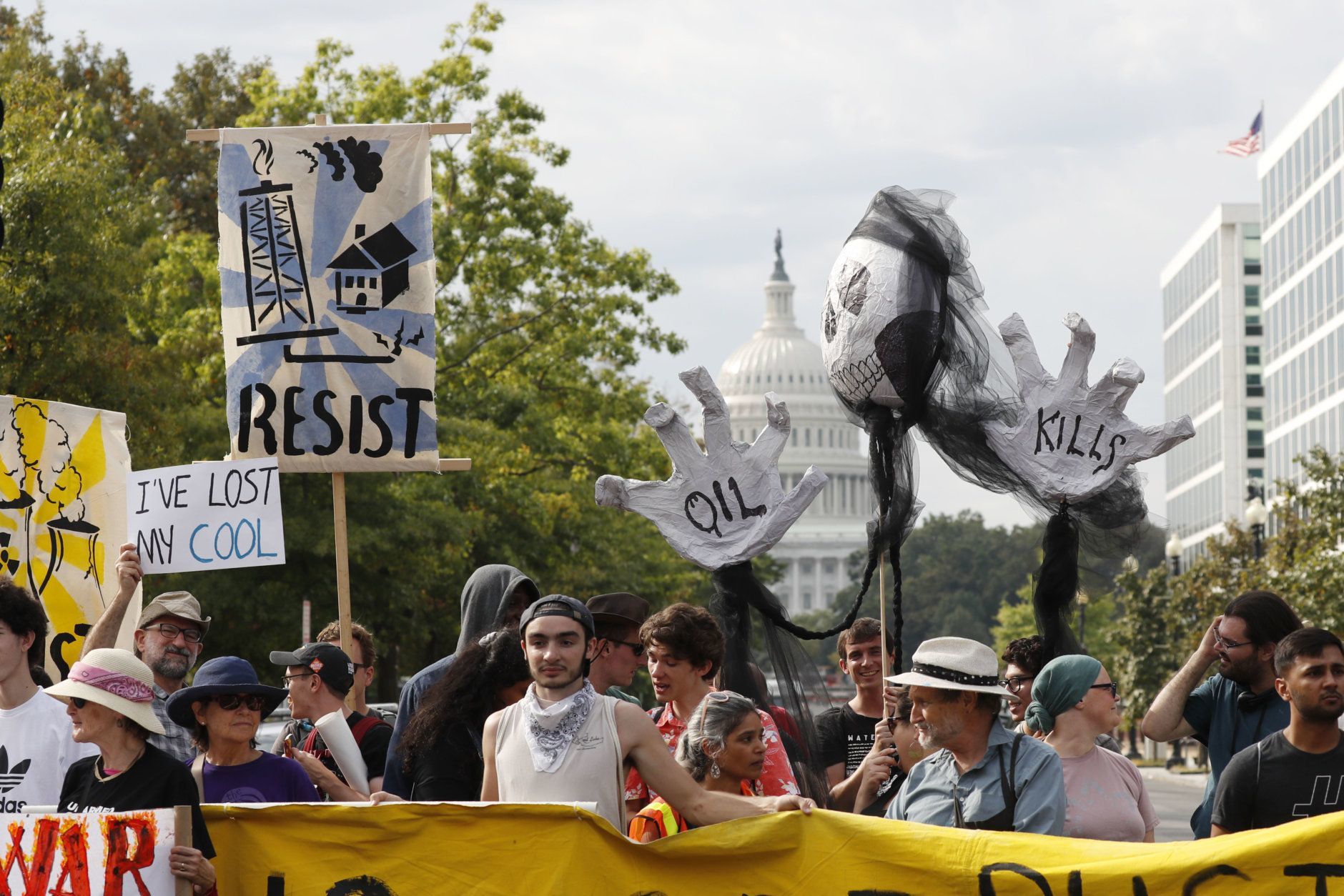 Protesters block traffic near the U.S. Capitol in Washington, Monday, Sept. 23, 2019. A broad coalition of climate and social justice organizations are disrupting the morning rush hour commute. (AP Photo/Pablo Martinez Monsivais)