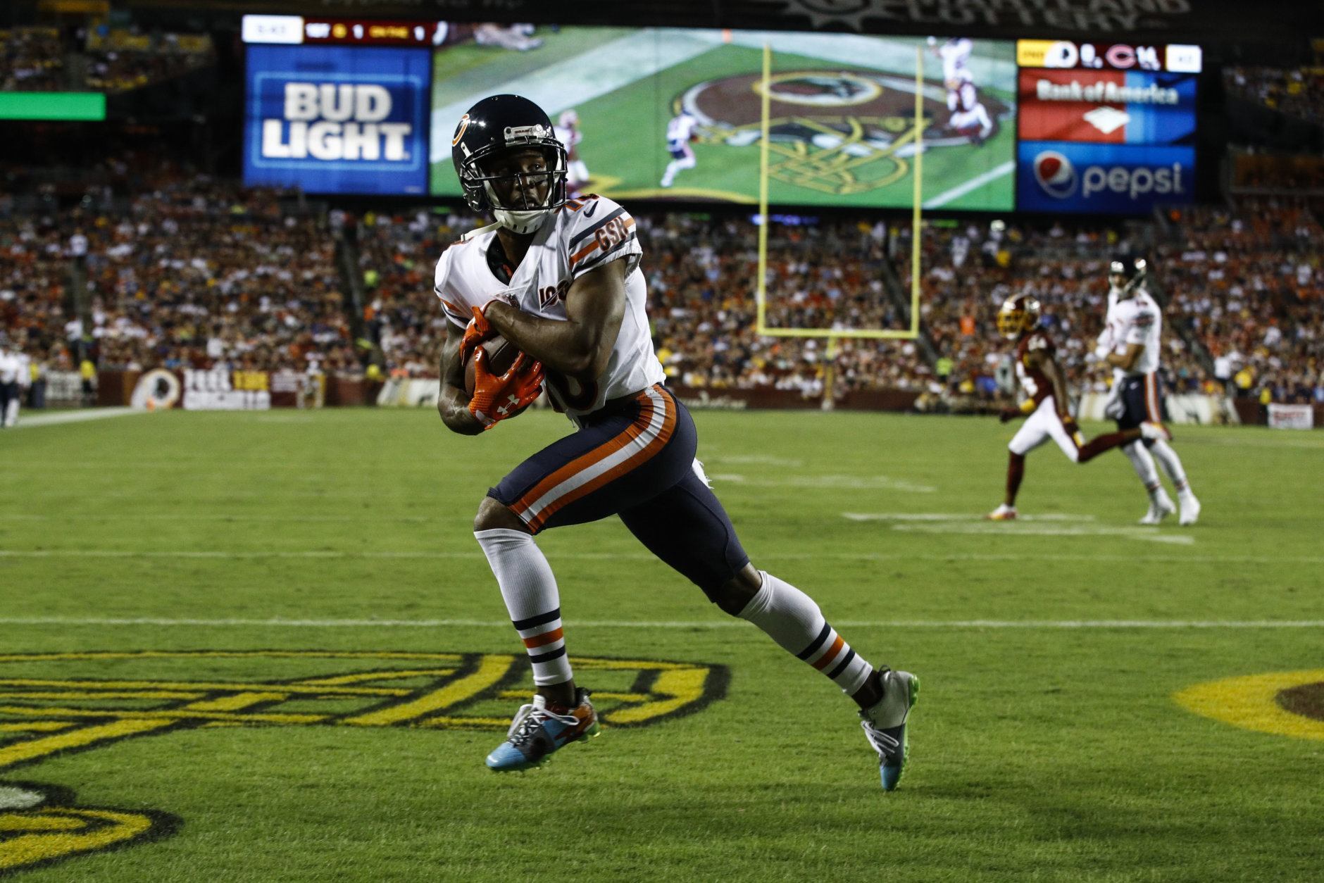 Chicago Bears wide receiver Taylor Gabriel (18) runs with his touchdown pass during the first half of an NFL football game against the Washington Redskins, Monday, Sept. 23, 2019, in Landover, Md. (AP Photo/Patrick Semansky)