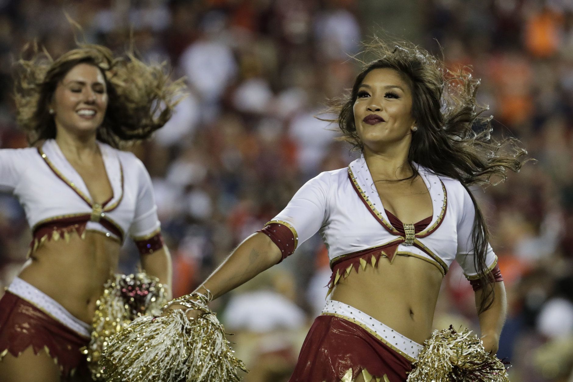 The Washington Redskins cheerleaders perform during the first half of an NFL football game between the Washington Redskins and the Chicago Bears, Monday, Sept. 23, 2019, in Landover, Md. (AP Photo/Julio Cortez)