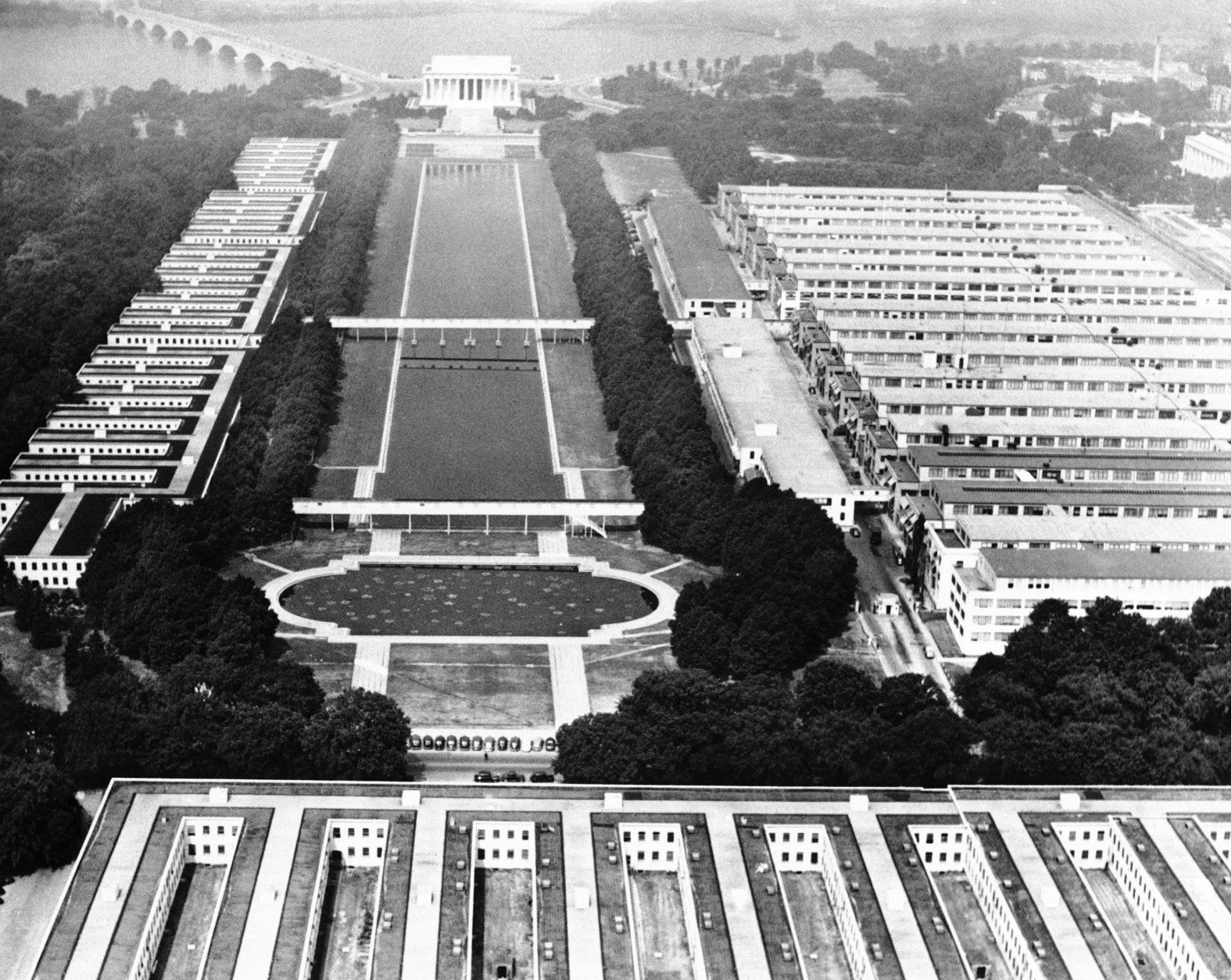 <p>Many pictures have been taken from the top of the Washington Monument, too. This one, taken in 1944, shows how many &#8220;tempos&#8221; — temporary government buildings — were on the National Mall during World War II.</p>
