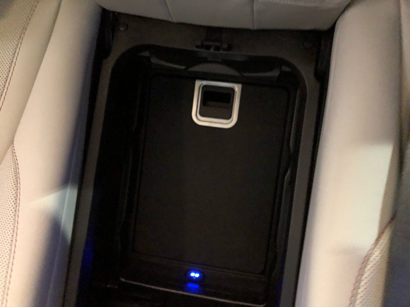 <p>There is also a rear compartment cool box that keeps beverages chilled. Trunk space isn’t as big as you would expect for a car of this size and the middle back seat isn’t very comfortable, but that just about rounds out my nitpicks.</p>
