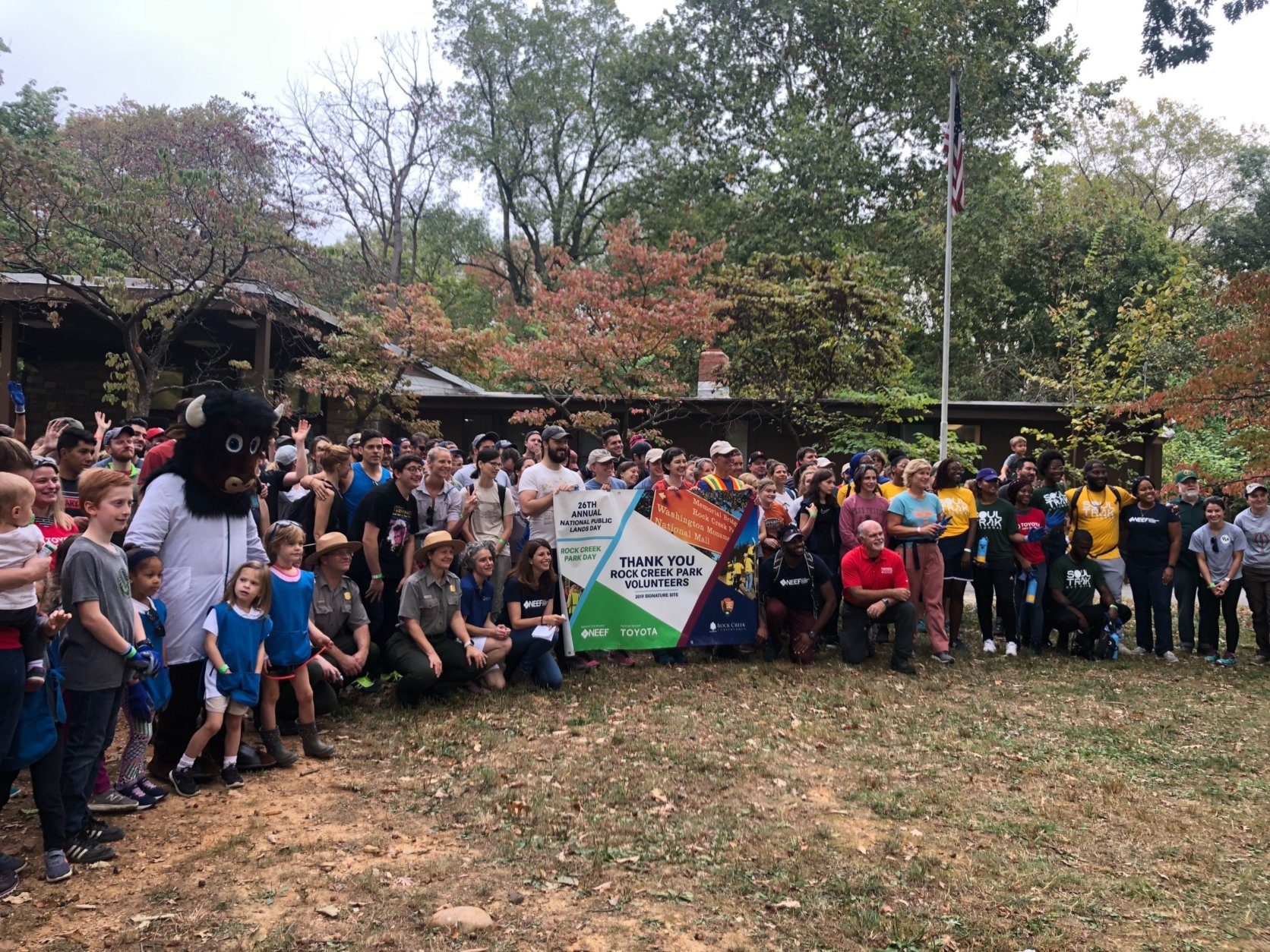 Volunteers gather for a group photo in Rock Creek Park on National Public Lands Day Sept. 28, 2019.