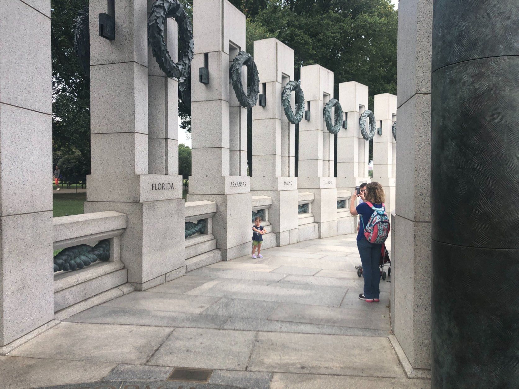 Visitors walk through the World War II memorial in Washington, D.C., on the 80th anniversary of the start of the conflict. 