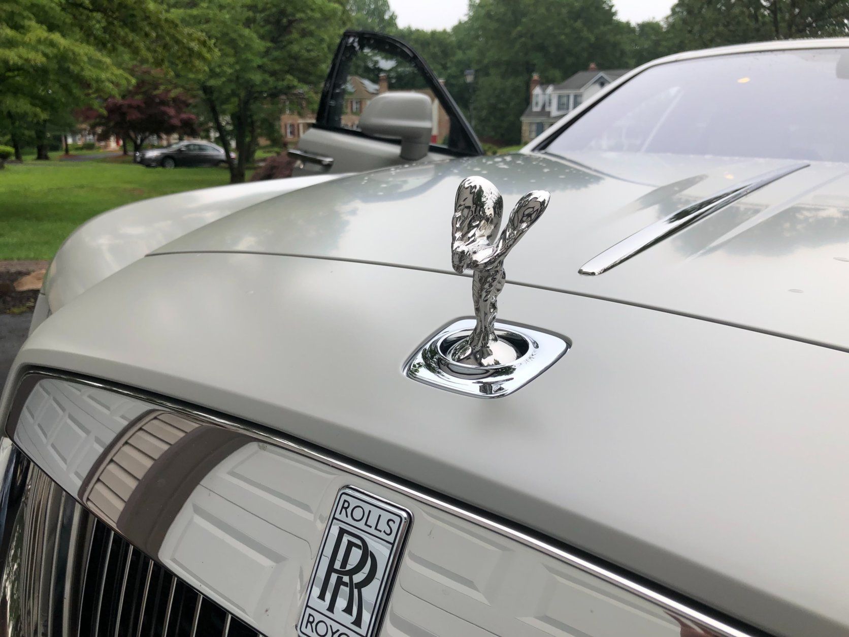 <p>I think Rolls-Royce was the originator of the larger front grill — it’s bright and rich-looking, made of metal with not a piece of plastic in sight.</p>
<p>The heritage of the brand is there, but the look is modern with LED lighting that gives a somewhat sleek front face. The hood is long and the Spirit of Ecstasy is front-and-center and retracts when parked or with a touch of a button.</p>
