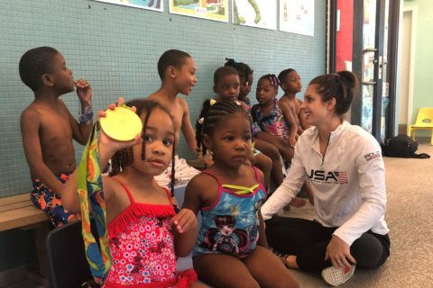 Olympian Katie Meili, all smiles in retirement, keeps busy with local public service