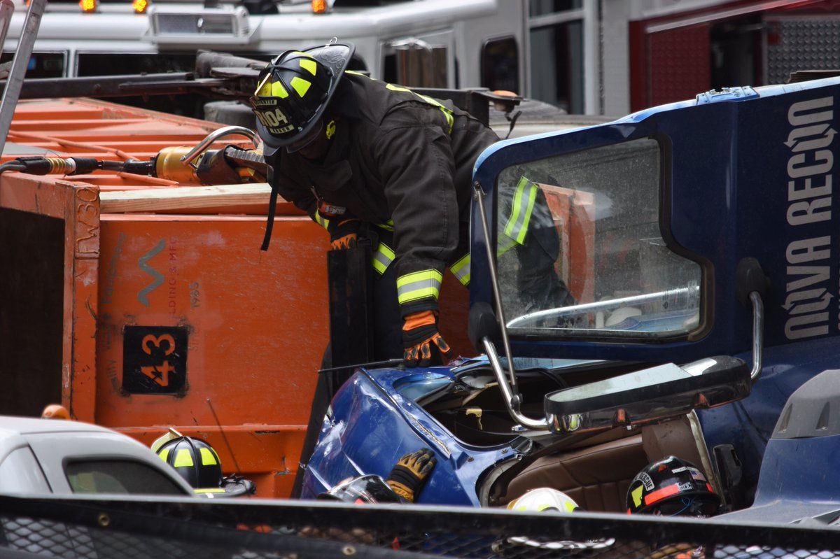 Firefighters responded to the overturned dump truck near the Chain Bridge.