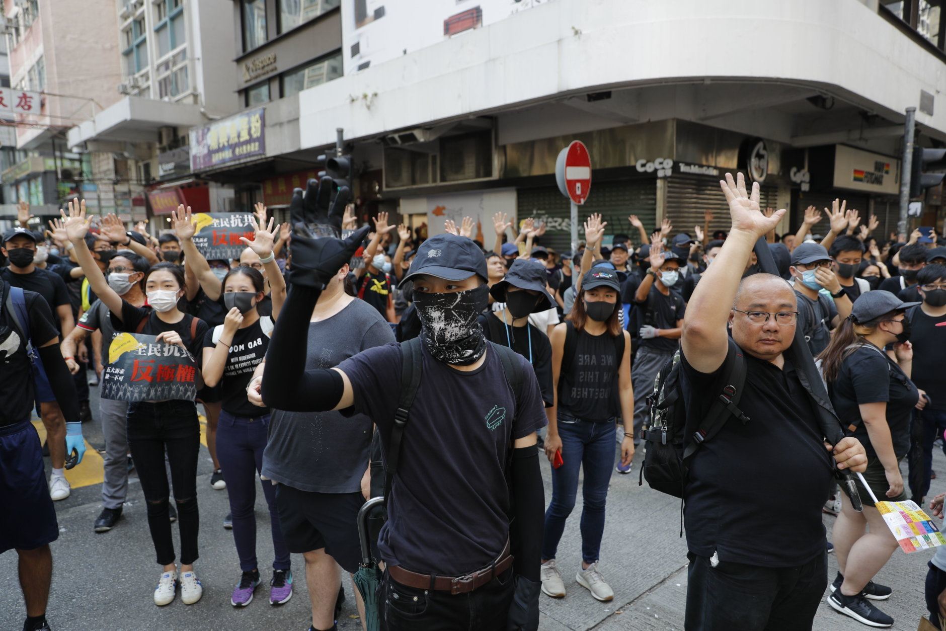 anti-government protestors march in hong kong