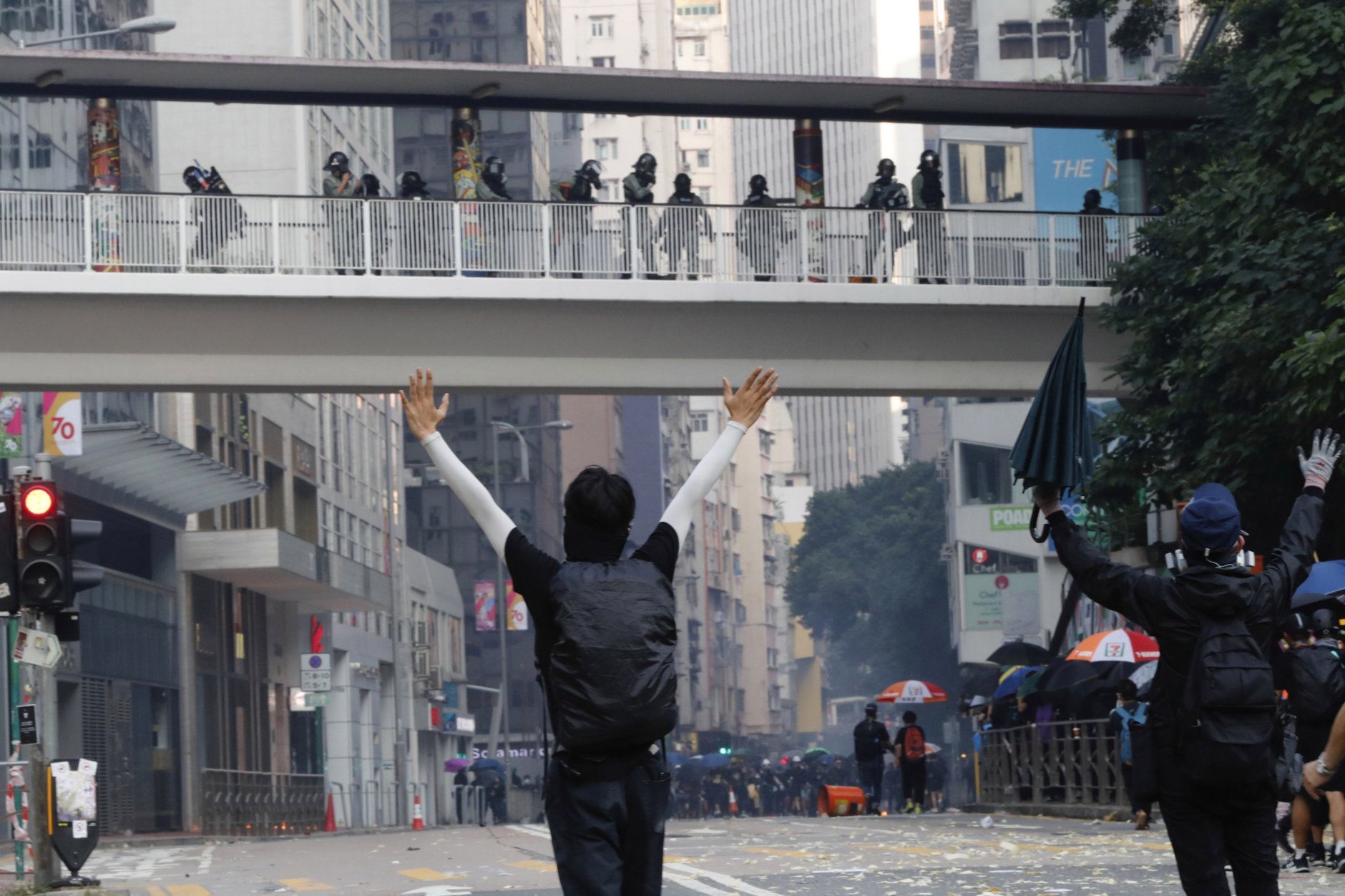 protesters face riot police in hong kong
