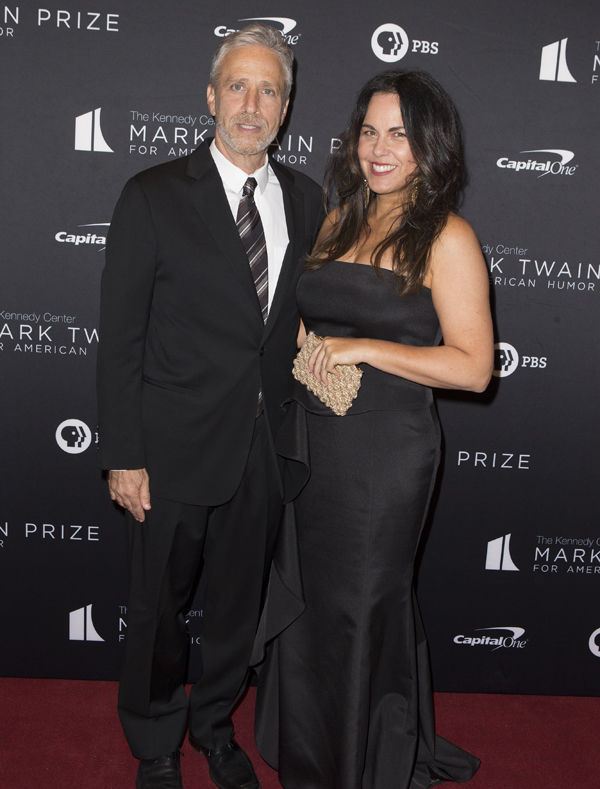 Jon Stewart, left, with his wife Tracey McShane arrive at the Kennedy Center for the Performing Arts for the 22nd Annual Mark Twain Prize for American Humor presented to Dave Chappelle on Sunday, Oct. 27, 2019, in Washington, D.C. (Photo by Owen Sweeney/Invision/AP)