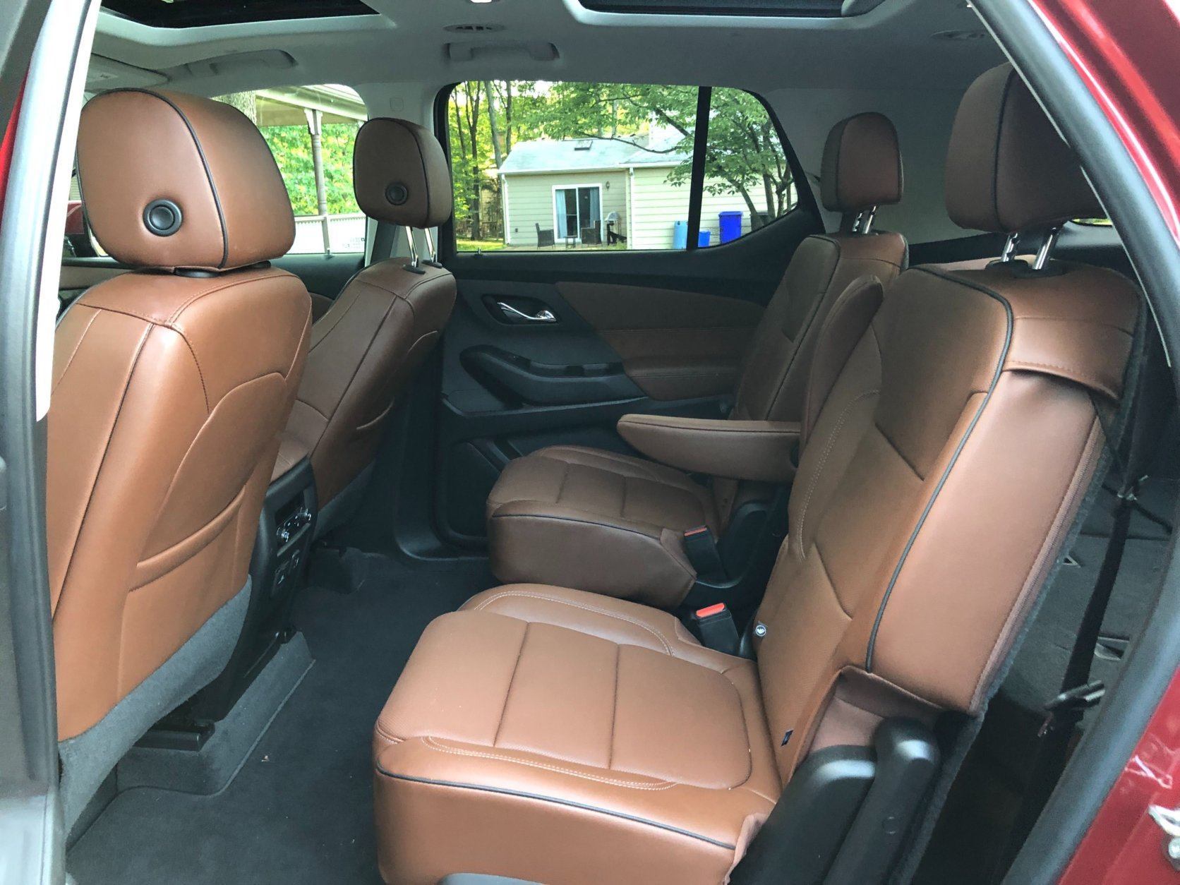 <p>You can access the third row by snaking through the middle row seats or flip a chair forward and crawl in. You have a surprising amount of storage space with all the seats in use. There’s even extra storage under the floor.</p>
