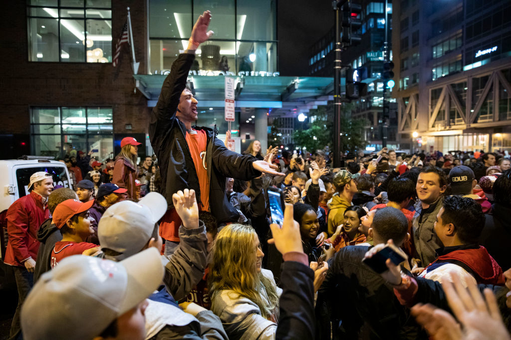 WASHINGTON, DC - OCTOBER 30: Washington Nationals fans do the Baby Shark dance in the streets outside of Nationals Park as they celebrate the Nationals World Series victory on October 30, 2019 in Washington, DC. The Washington Nationals defeated the Houston Astros 6-2 in Game 7 of the World Series bringing home the first World Series Championship in franchise history and the first to Washington, DC since 1924. (Photo by Samuel Corum/Getty Images)
