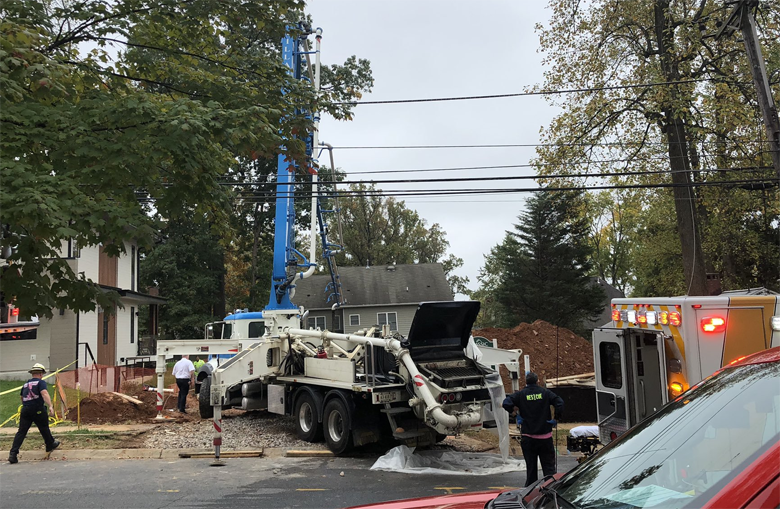 An articulated boom that was helping pour concrete struck overhead wires at around 12:30 p.m. and pitched him into the trench, according to Montgomery County Fire and Rescue. It also brought down the power line.