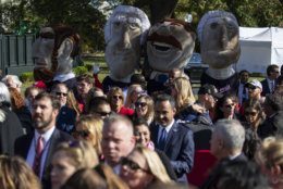 Fans watch during an event with President Donald Trump to honor the 2019 World Series Champion, Washington Nationals baseball team, at the White House, Monday, Nov. 4, 2019, in Washington. (AP Photo/ Evan Vucci)