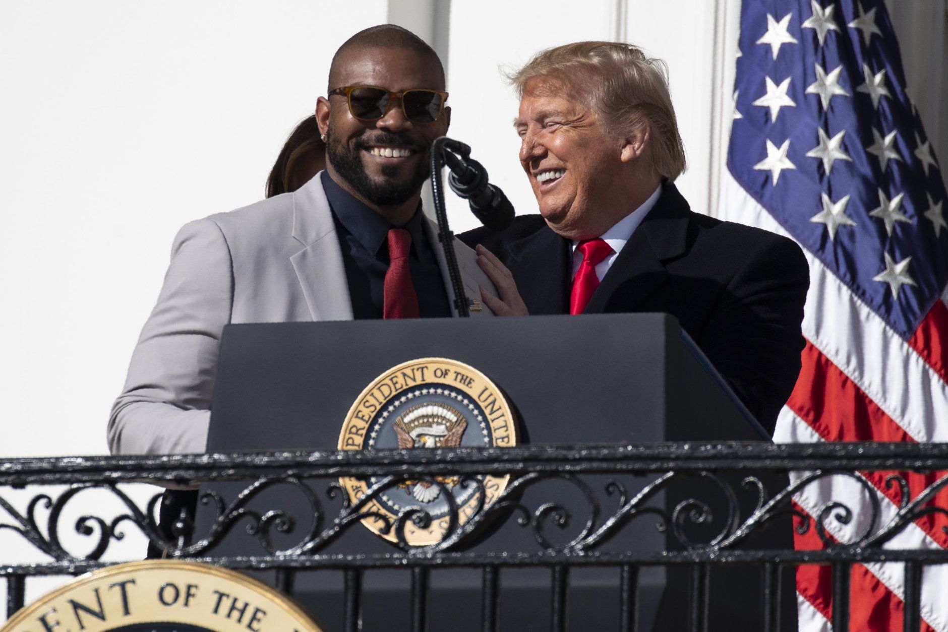 President Donald Trump invites Washington Nationals infielder Howie Kendrick to speak during an event to honor the 2019 World Series Champion, Washington Nationals baseball team, at the White House, Monday, Nov. 4, 2019, in Washington. (AP Photo/ Evan Vucci)