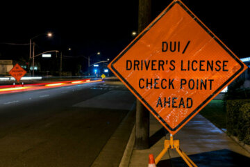 Road sign for a DUI checkpoint.
