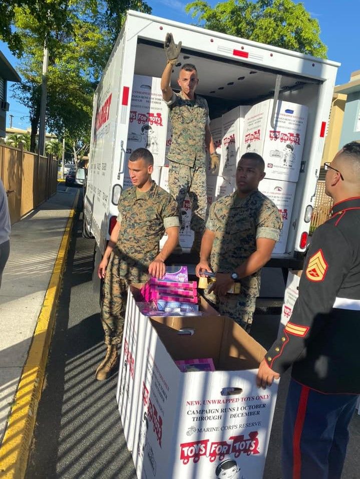 Puerto Rico Campaign Marines are unloading boxes on Dec. 7. (Courtesy the Puerto Rico Toys for Tots Campaign)