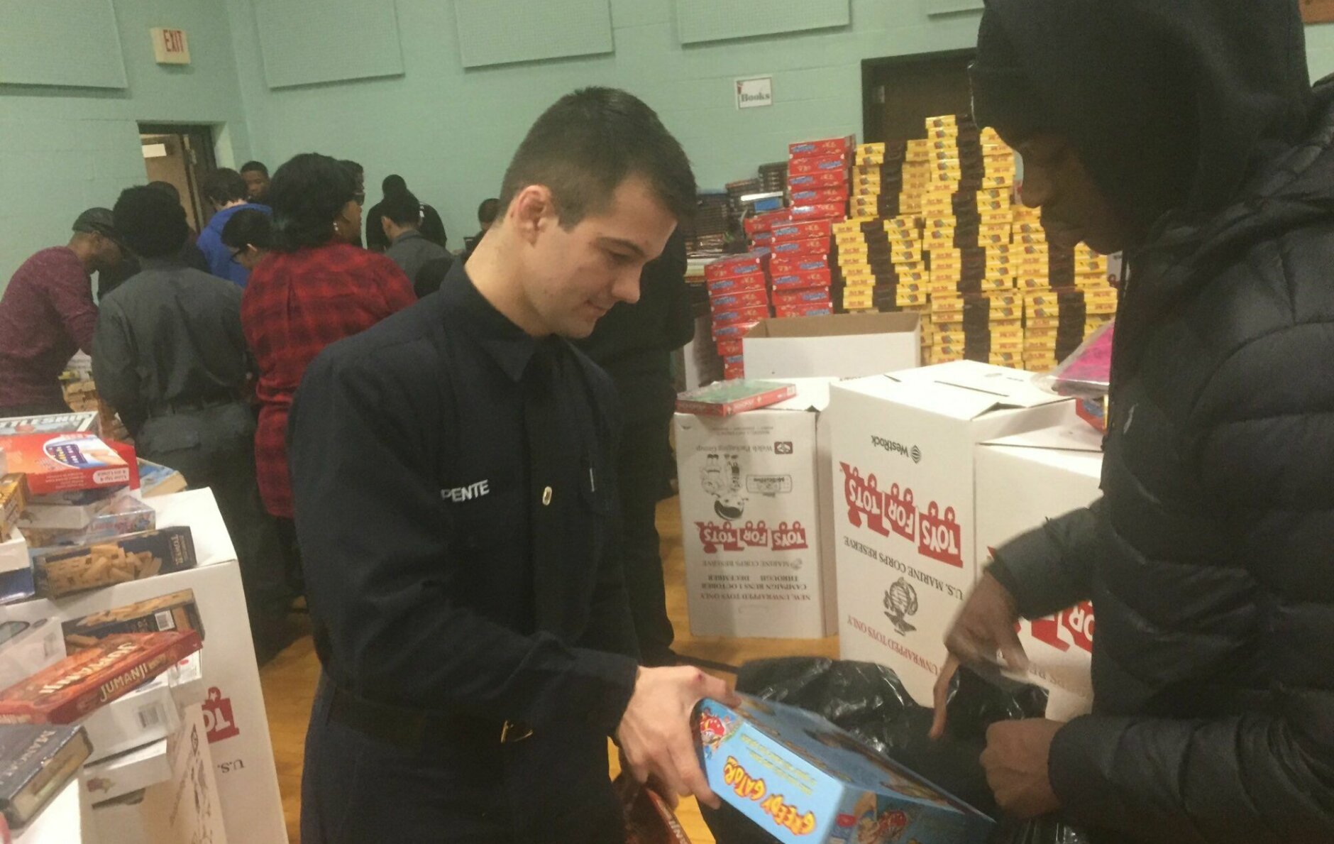 cadet handing out toys
