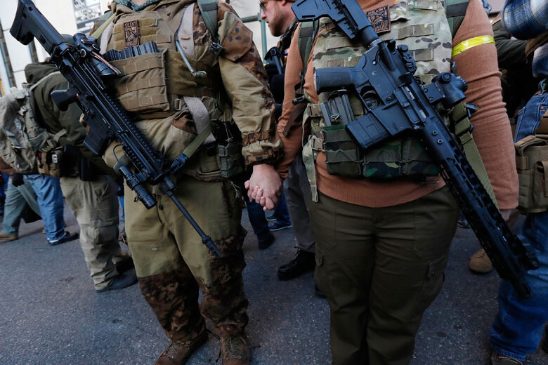 St. Louis Rams cheerleaders entertain the crowds in camouflage