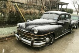 old car covered in snow