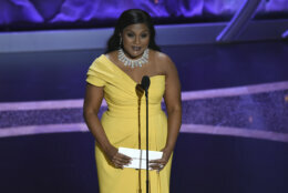 Mindy Kaling presents the award for best animated feature film at the Oscars on Sunday, Feb. 9, 2020, at the Dolby Theatre in Los Angeles. (AP Photo/Chris Pizzello)