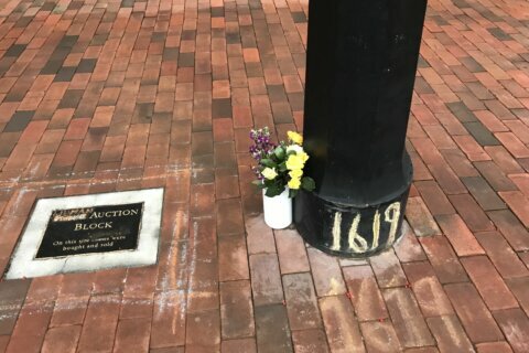 Police arrest activist who admitted taking Charlottesville slave auction block